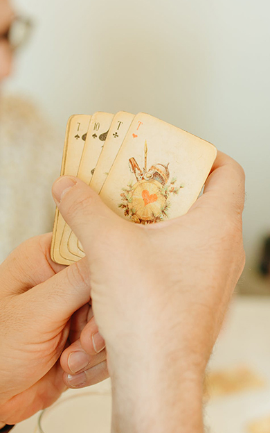 hand-holding-playing-cards