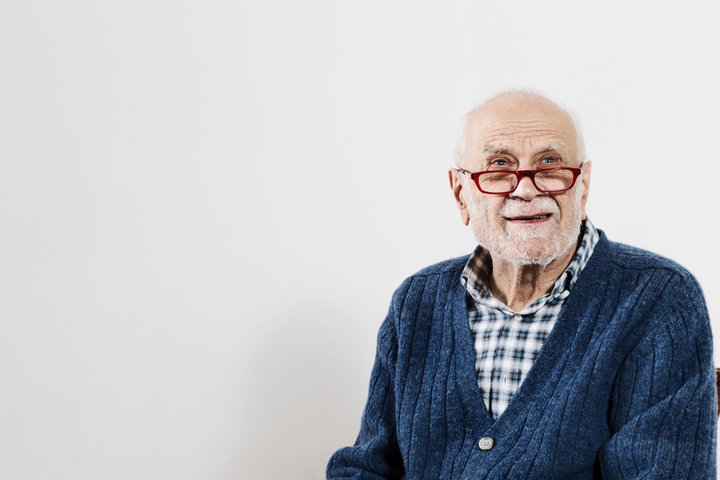 Portrait of senior man on a white background
