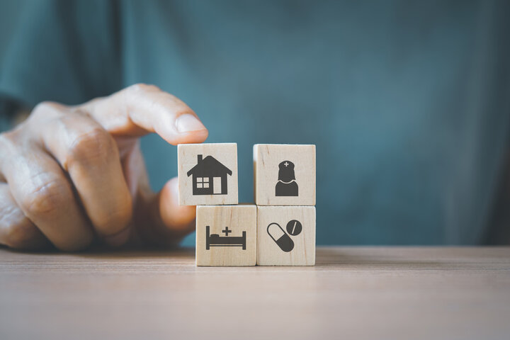 wooden blocks with care services images on them