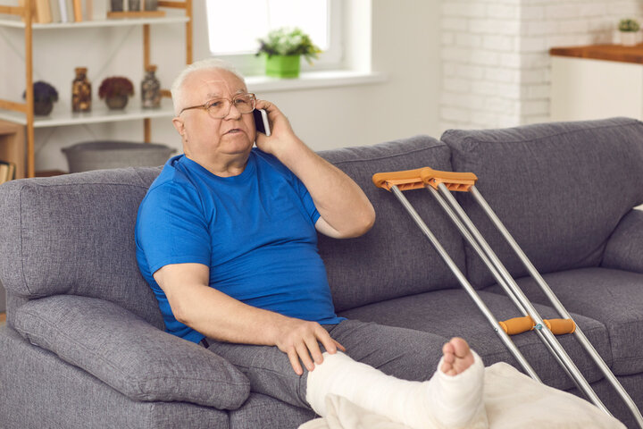 man with crutches