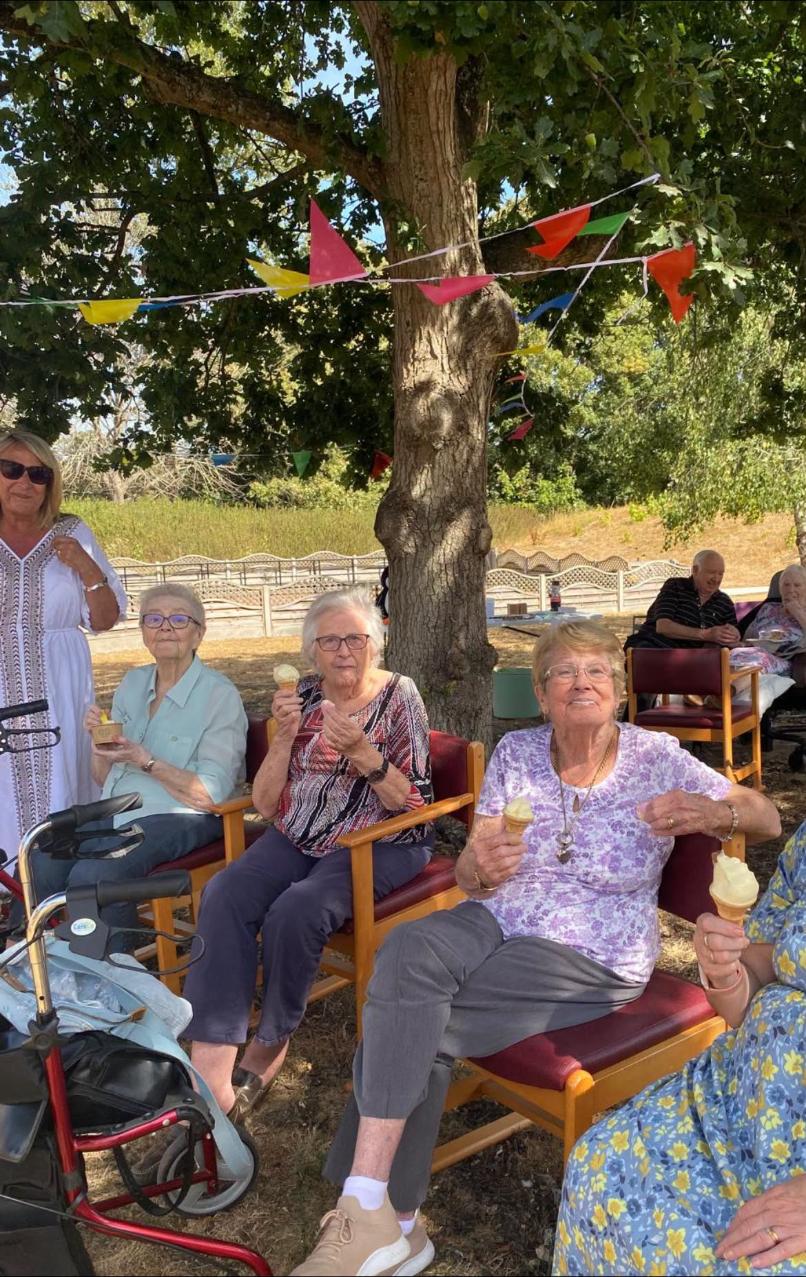residents smiling with ice creams